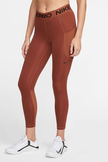 Buy Nike Orange Pro Dri-FIT 365 Mid-Rise 7/8 Leggings with Pockets