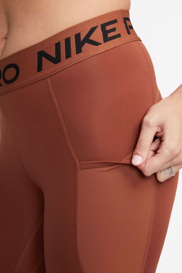 Buy Nike Orange Pro Dri-FIT 365 Mid-Rise 7/8 Leggings with Pockets from  Next Belgium