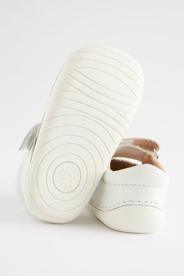 White leather store baby shoes