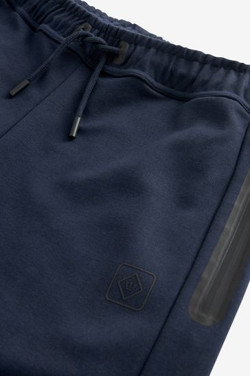 Navy cuffed joggers shop