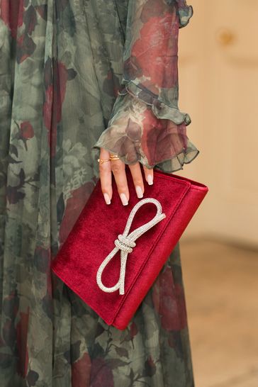 Buy Novo Red Alium Diamante Bow Detail Clutch Bag from Next Singapore