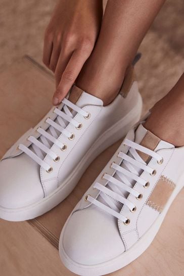 Buy Mint Velvet Cream White Patchwork Trainers from Next Singapore