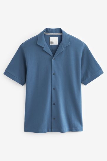 Buy Blue Textured Cuban Collar Button Through Polo Shirt from Next