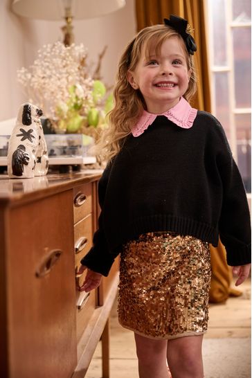Ladies gold sequin skirt top