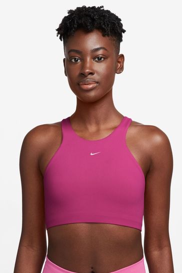 Buy Nike Fuchsia Pink Yoga DriFIT Alate Medium Support Lightly Lined Sports  Bra from Next Luxembourg