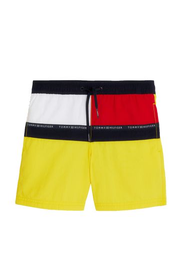 Buy Tommy Hilfiger Medium Yellow Drawstring Swim Shorts from Next