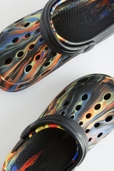 Orange lined store crocs