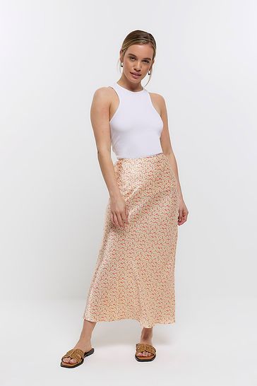Buy River Island Pink Petite Floral Easy Bias Maxi Skirt from Next