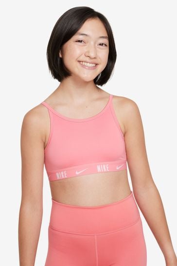 Buy Nike Coral Pink Trophy Light Support Sports Bra from Next