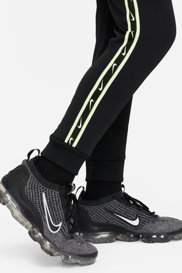 Nike repeat best sale tape joggers black