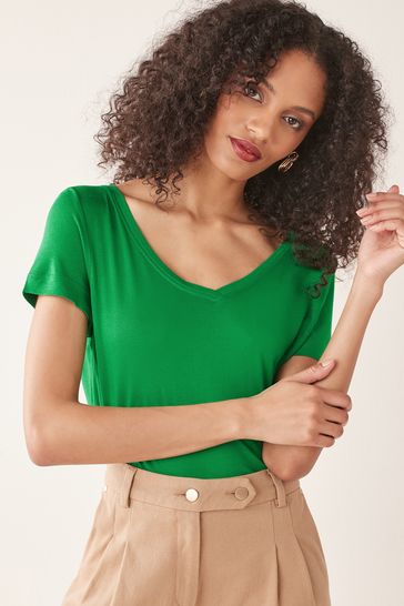Camiseta de cuello de pico en verde brillante de corte holgado