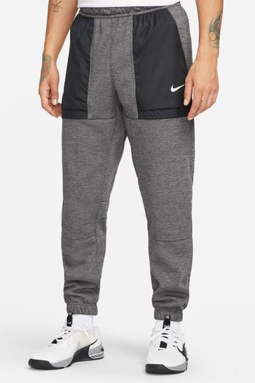 Buy Nike Grey Therma FIT Novelty Tapered Joggers from Next Luxembourg