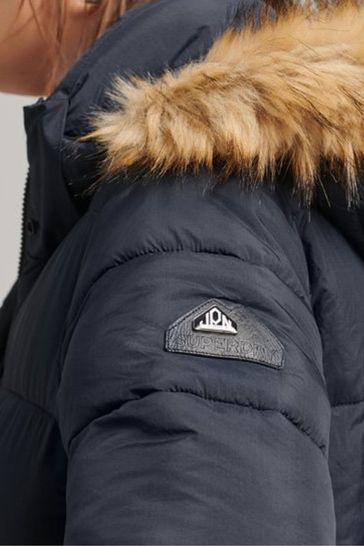 Buy Superdry Blue Faux Fur Hooded Longline Puffer Jacket from Next