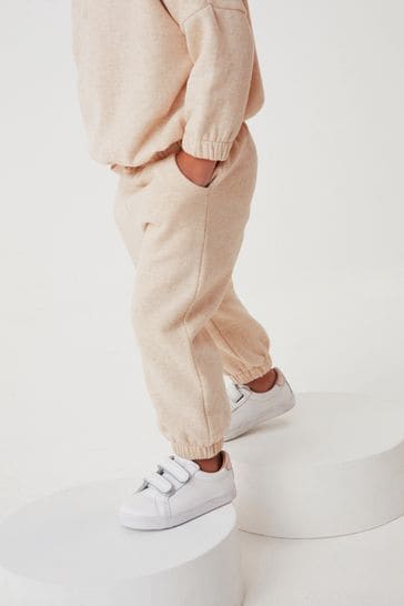 Pantalones de chándal lisos color crema (3 meses-7 años)