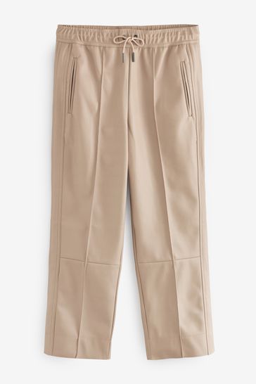 Buy Taupe Neutral Next PU Faux Leather Taper Trousers from Next Netherlands