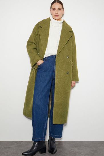Boucle coat green top