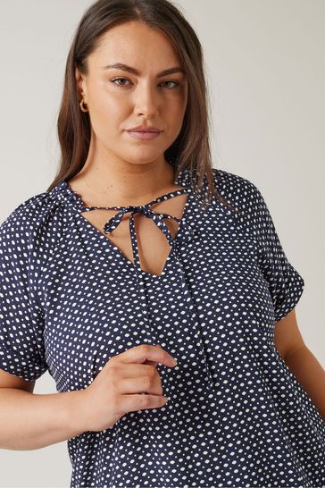 Buy Evans Curve Dot Print Tie Neck Blouse from Next Italy