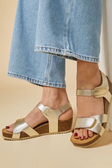 Brown and gold store sandals