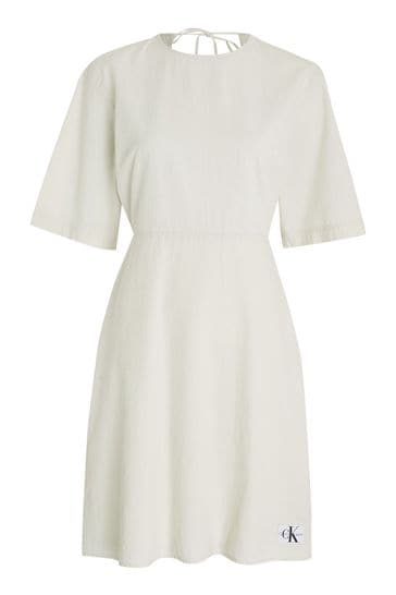 Buy Calvin Klein Natural 100 Cotton Back Detail Seersucker Dress from Next Oman