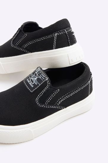 Buy River Island Black Boys Canvas Slip Ons Trainers from Next Kuwait