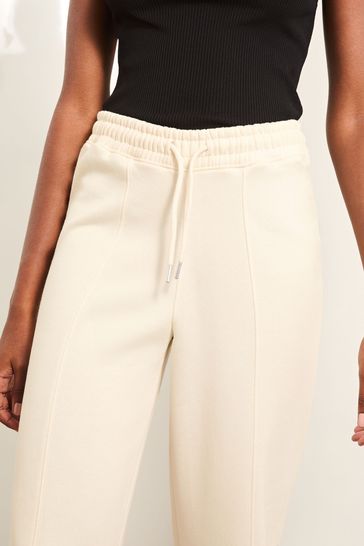 Buy Lipsy Cream Petite Sweat Wide Leg Joggers from Next Netherlands