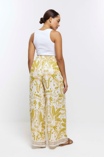 Yellow trousers river island top