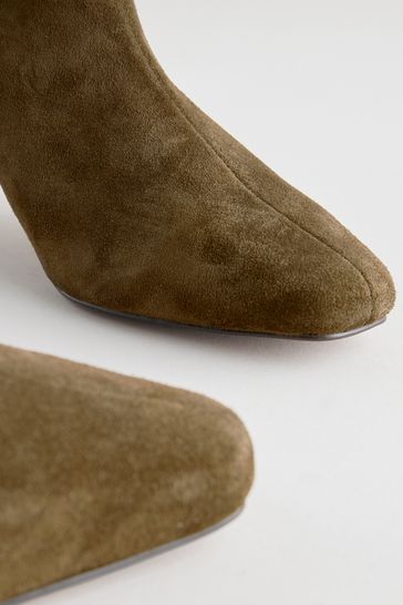 Knee high green boots discount