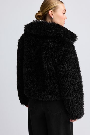 Buy Black Short Faux Fur Jacket from Next Bahrain