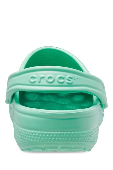 Lime green and deals black crocs