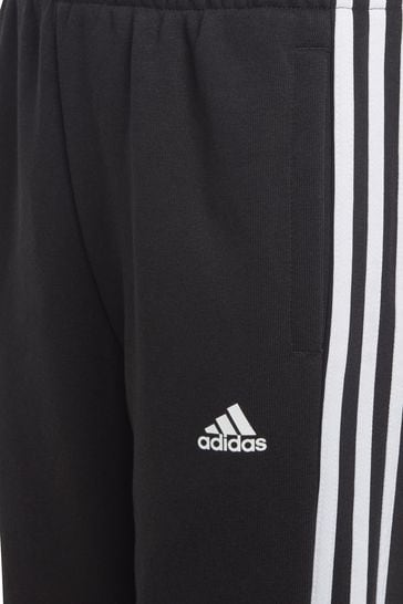 Adidas essentials solid tracksuit bottoms 2025 black
