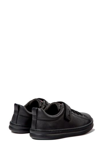 Kids black athletic best sale shoes