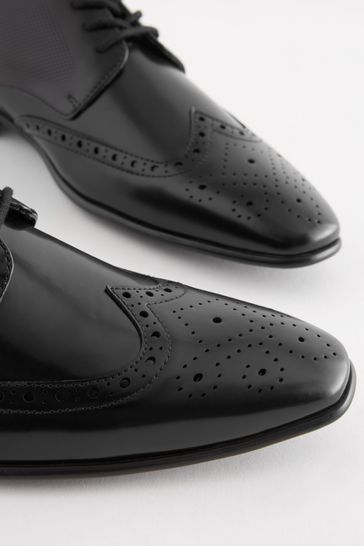 Shiny black brogues on sale