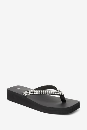 Black wedge deals flip flops uk