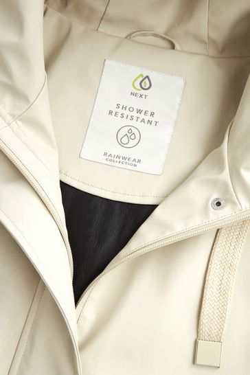 Buy Neutral Stone Rubber Showerproof Rain Jacket from Next Denmark