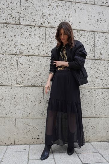 Buy Religion Black Tiered Maxi Skirt In Sheer Georgette and Short Lining from Next Estonia