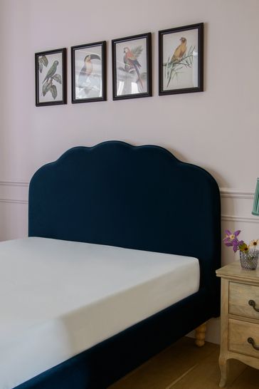 Scalloped upholstered deals bed