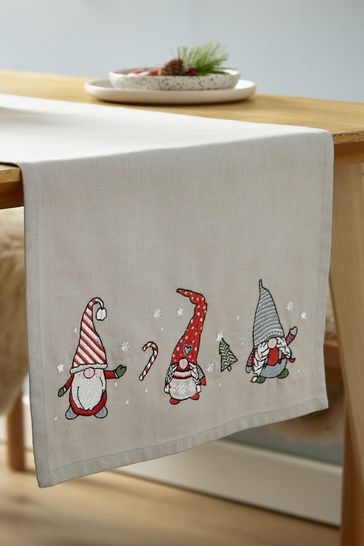 Catherine Lansfield Red Christmas Gnomes Wipeable Table Runner