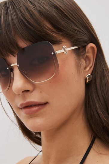 Brown rimless sunglasses top