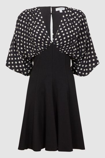Black polka dot skater dress store