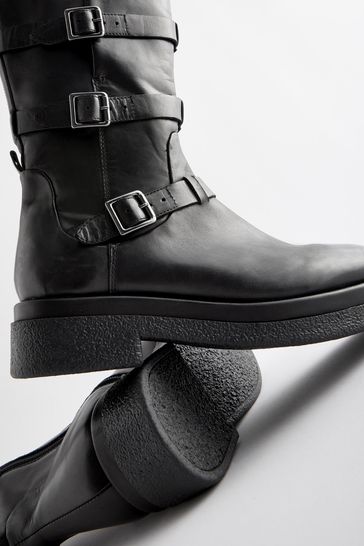 Boots with a buckle clearance