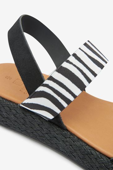 Animal wedge online flip flops