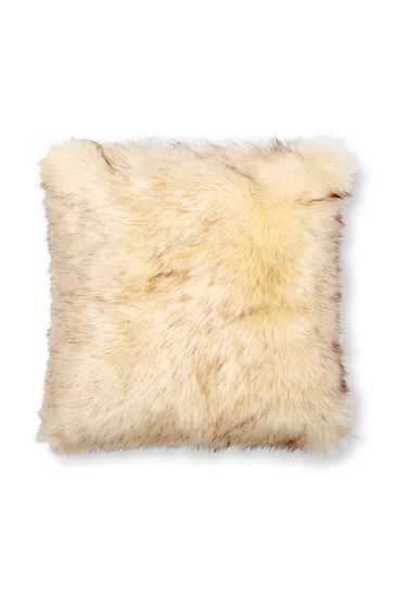 Beige faux fur pillows top