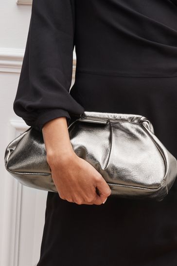 Write a report sum Distant Buy Metallic Frame Clutch Bag from Next USA