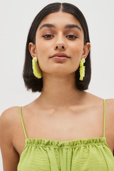 Lime green statement earrings top