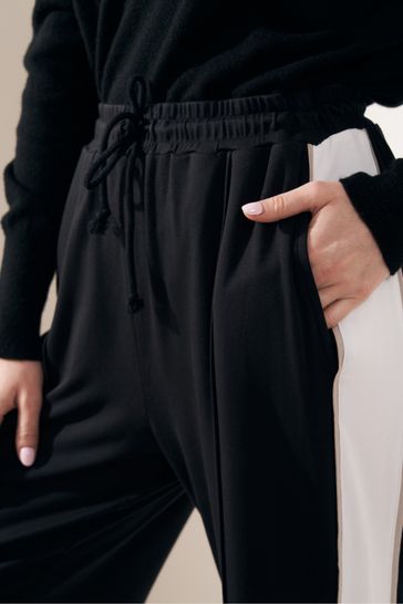 Black wide best sale leg jogging bottoms