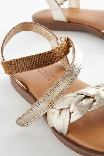 Gold store plaited sandals