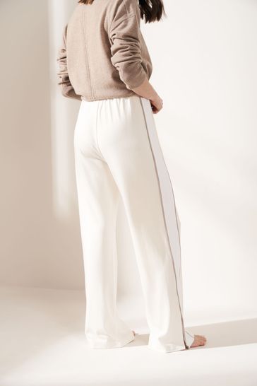 Cream jogging bottoms online