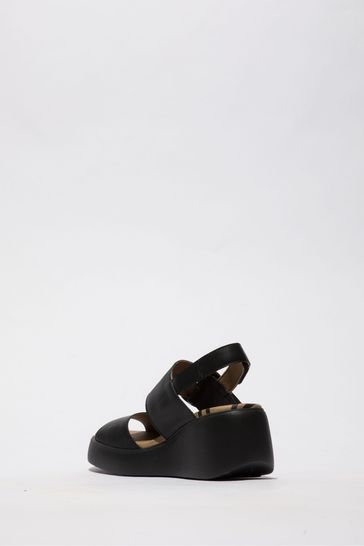 Fly black deals wedge sandals