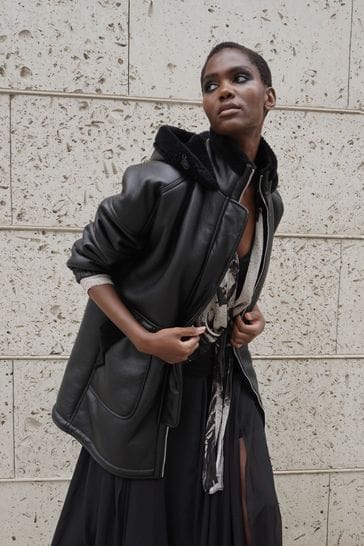 Buy Religion Black Shearling and Leather Look Globe Coat with Hood from Next Luxembourg