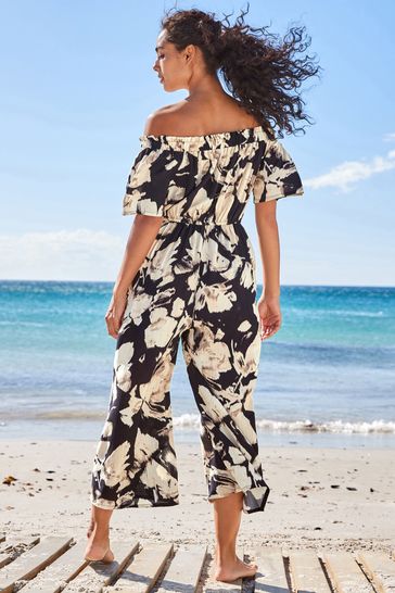 Black and white off the shoulder jumpsuit hot sale